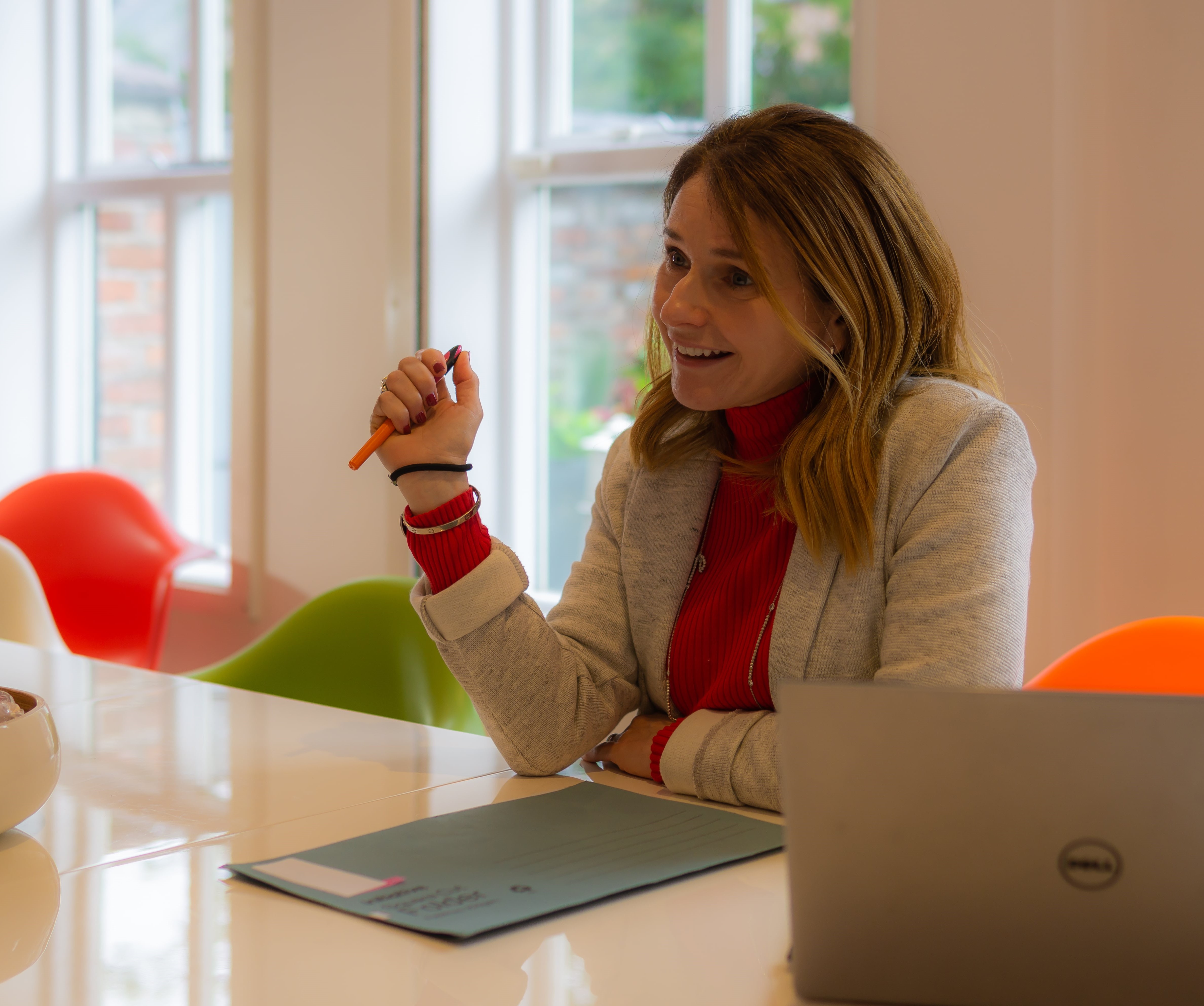 Marcia Lister smiling and listening