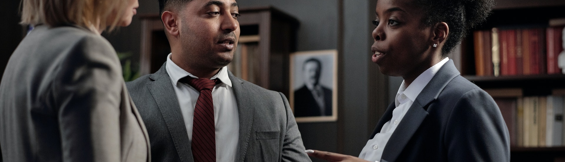 Three lawyers talking together