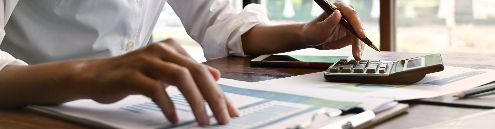 a woman looks through finances